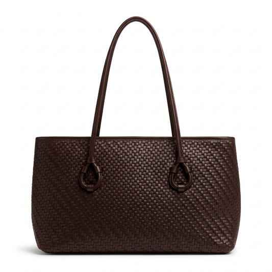 Chocolate-brown tote with a shorter body and long handles on a white studio background